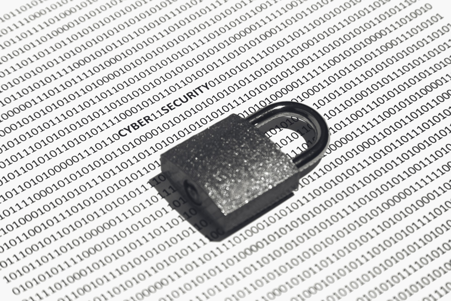 closeup-shot-of-a-lock-on-a-white-surface-with-binary-code-on-it-concept-of-cybersecurity