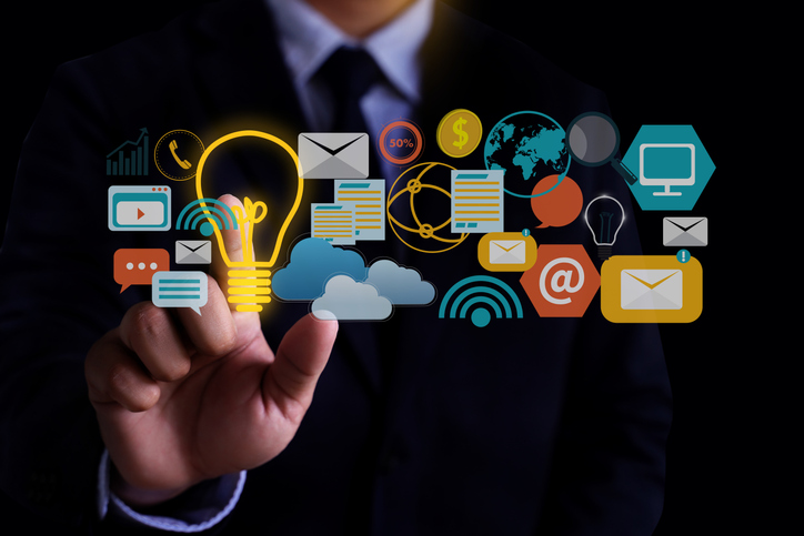 DIGITAL MARKETING Business team hands at work with financial reports and a laptop