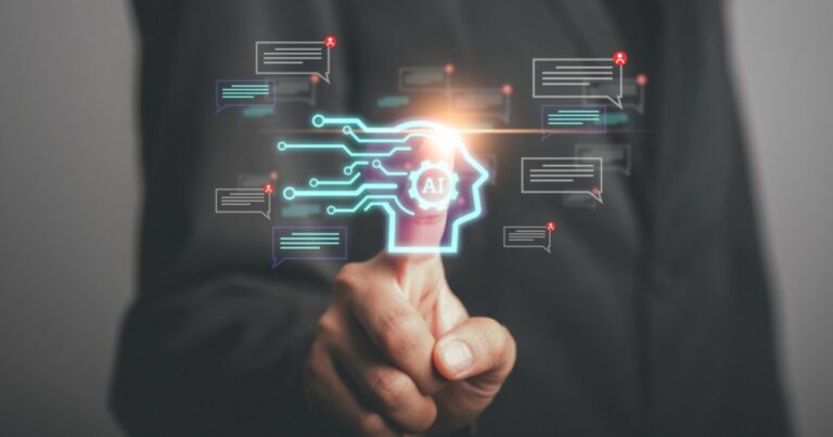 Representação visual de agentes de IA, com um dedo apontando para um ícone brilhante em forma de perfil humano conectado por circuitos, com a sigla "AI" no centro. Ao redor, balões de texto estilizados sugerem comunicação e interação automatizada. O fundo desfocado e escuro reforça o foco na tecnologia, simbolizando o papel dos agentes de IA em processos inteligentes e dinâmicos (Agentes de IA, gartner, Shutterstock, Microsoft)